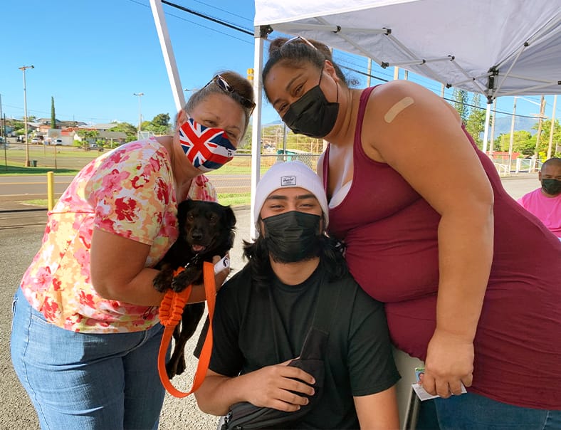 Wahiawā Family with bag of food